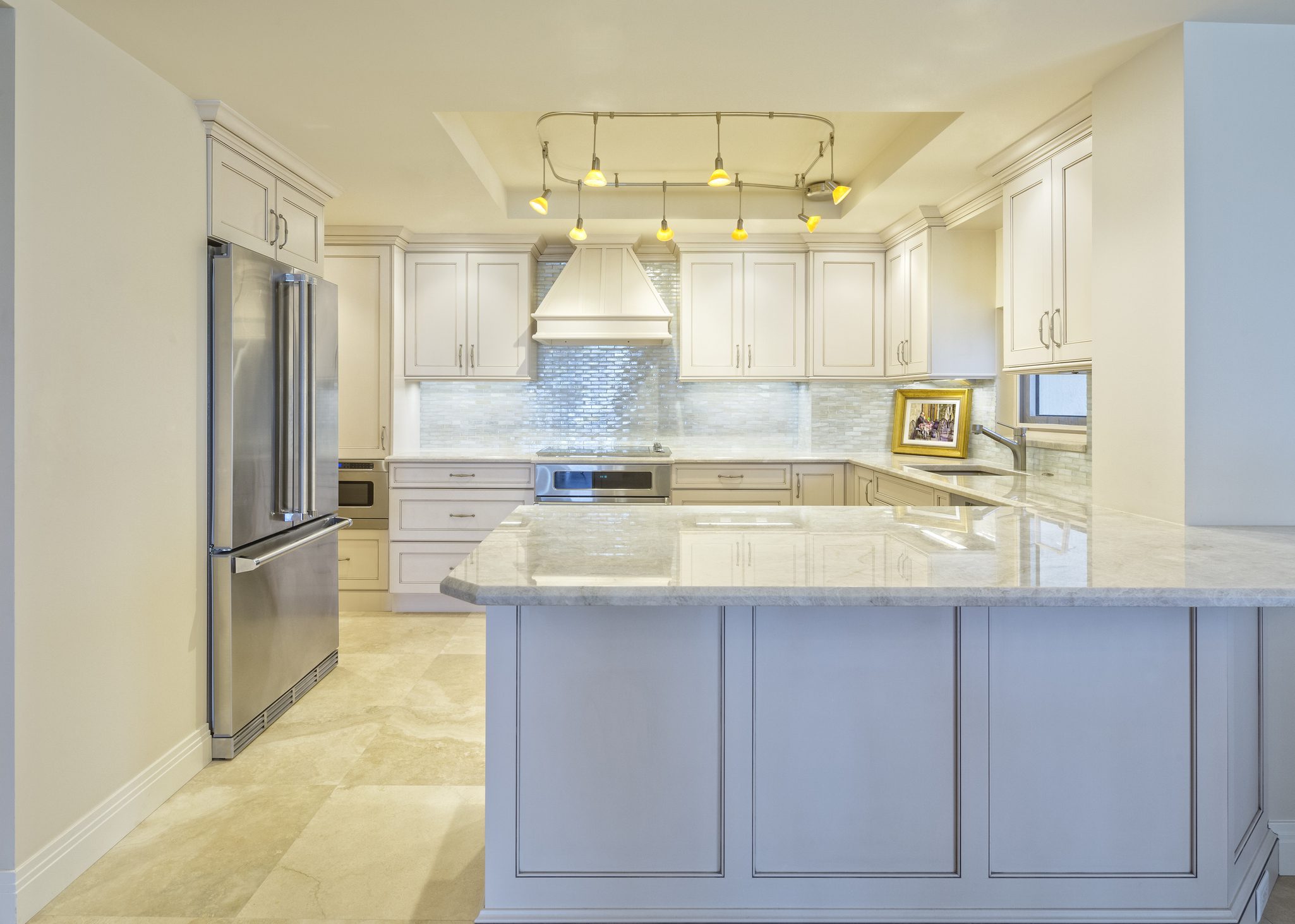 Beautiful Remodeled Kitchen in a Condominium. (Picture in frame is mine.)